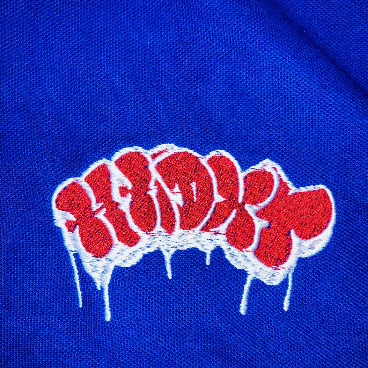 PLAYERA ALEMAN TIPO POLO BLANCO/AZUL/ROJO