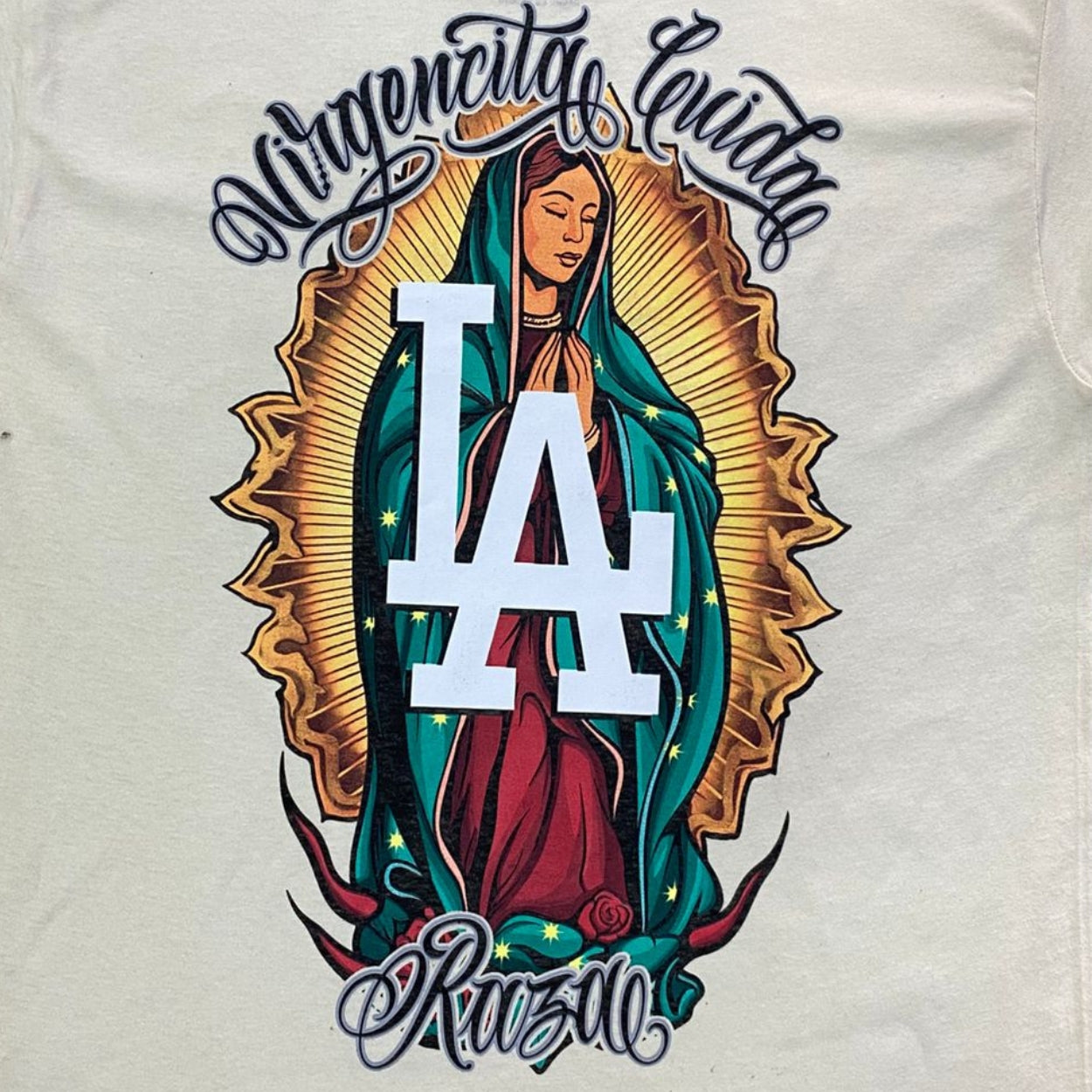 PLAYERA SS CREMA VIRGEN CUIDA LA RAZA