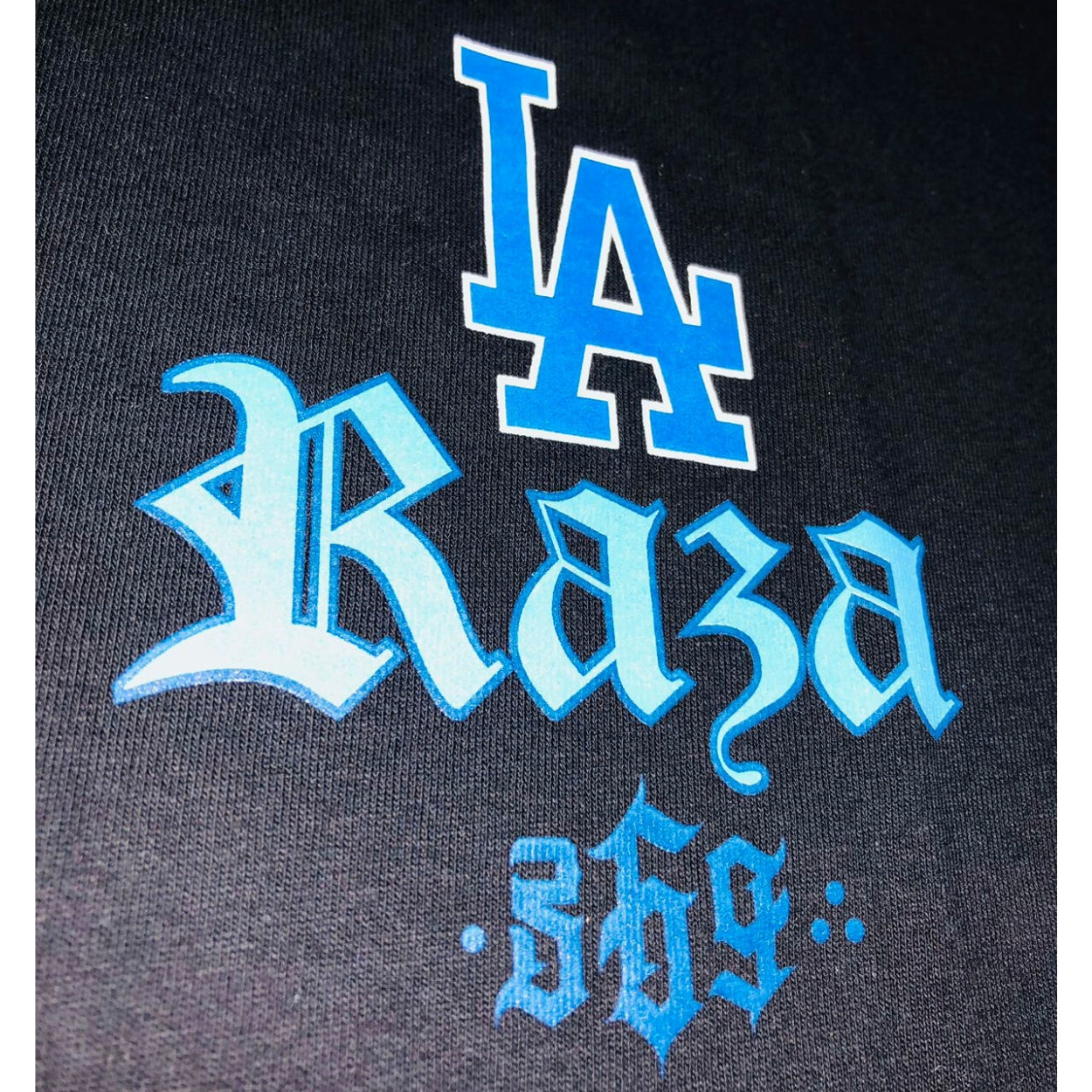 PLAYERA SS NEGRA LA RAZA