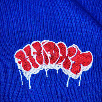 PLAYERA ALEMAN TIPO POLO BLANCO/AZUL/ROJO